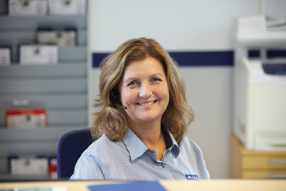 Blid dame som jobber på MECA sentralbord